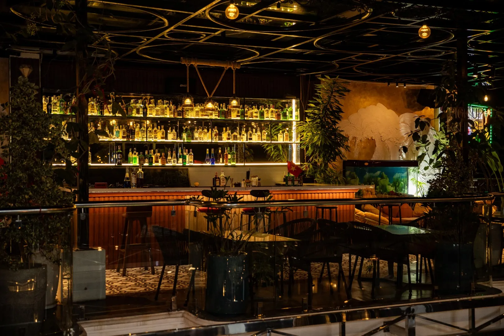 The cocktail bar at Roza Bar rooftop in Cat Ba at night