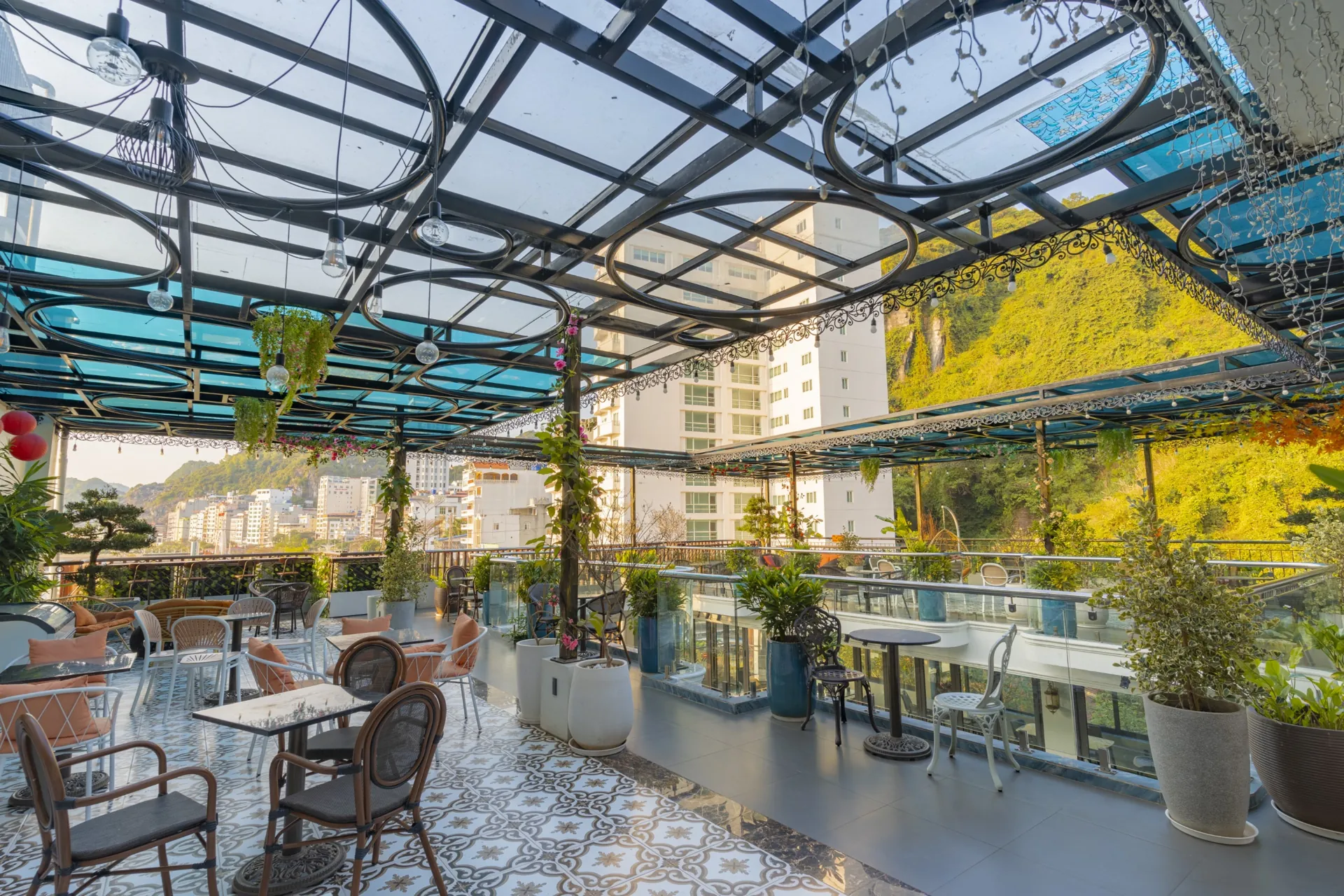 Late-afternoon light on the Roza Bar rooftop terrace in Cat Ba